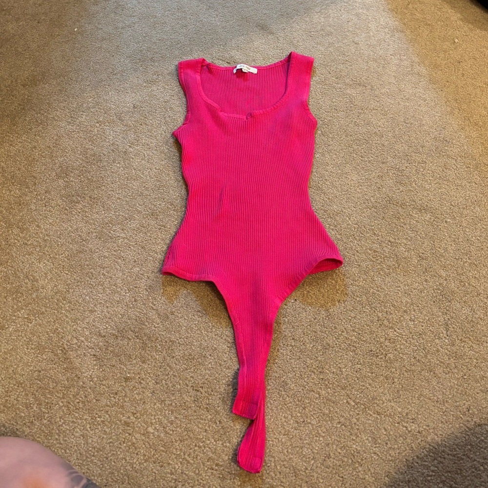 pink body suit